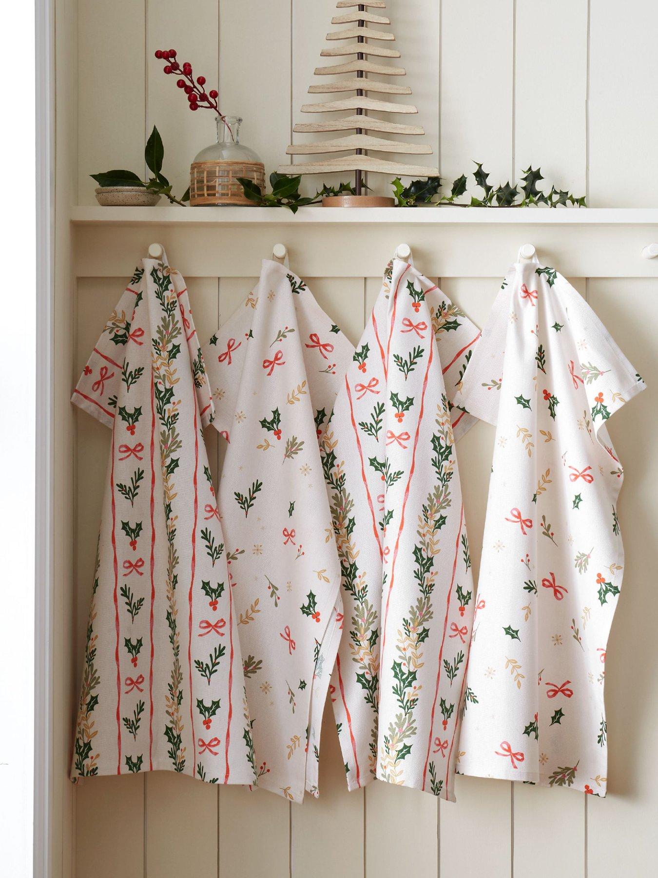 Image 1 of 3 of Catherine Lansfield 100% Cotton Christmas Holly Stripe Tea Towels 4 Pack