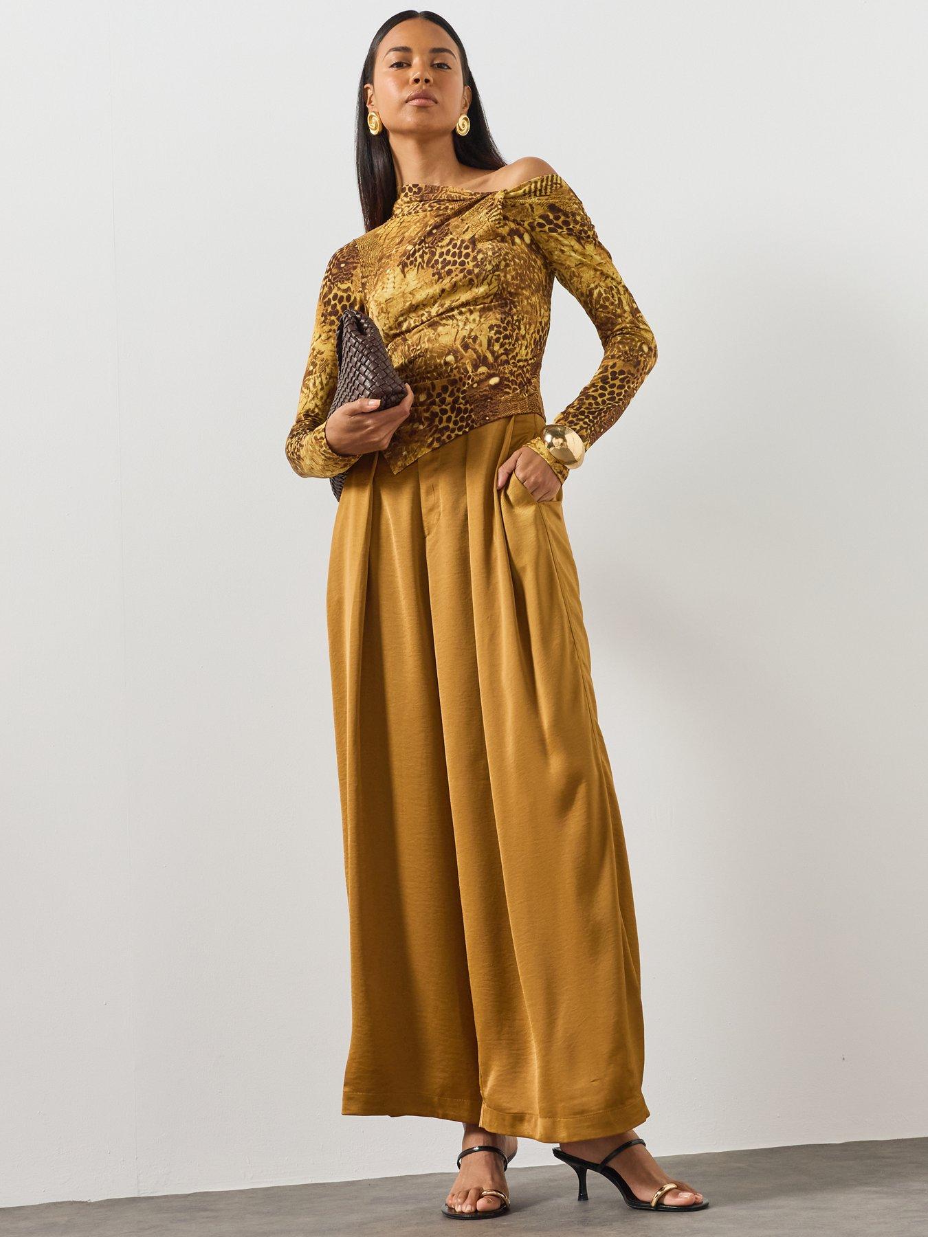 Image 3 of 6 of AllSaints Arlie Long Sleeve Off The Shoulder Top - Gold