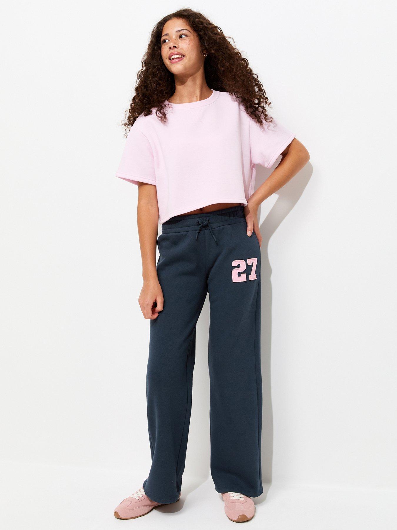 Image 1 of 5 of New Look 915 Girls Navy Cotton Rich Logo Patch Straight Leg Joggers