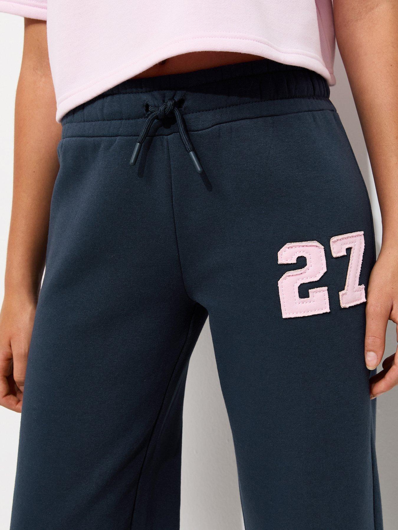 Image 4 of 5 of New Look 915 Girls Navy Cotton Rich Logo Patch Straight Leg Joggers