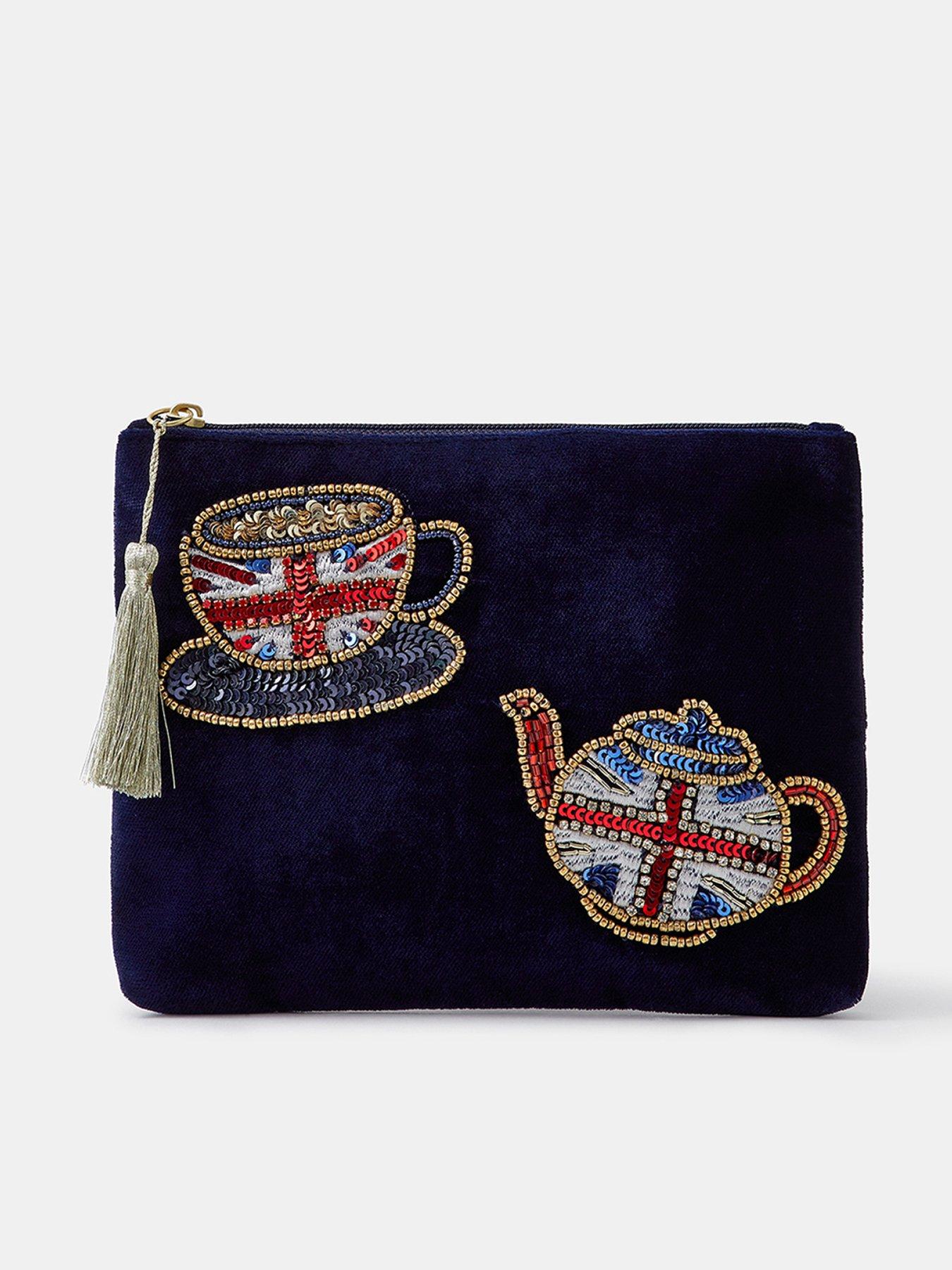 Image 1 of 4 of Accessorize Womens London Embellished Motif Zip Top Slim Pouch - Blue