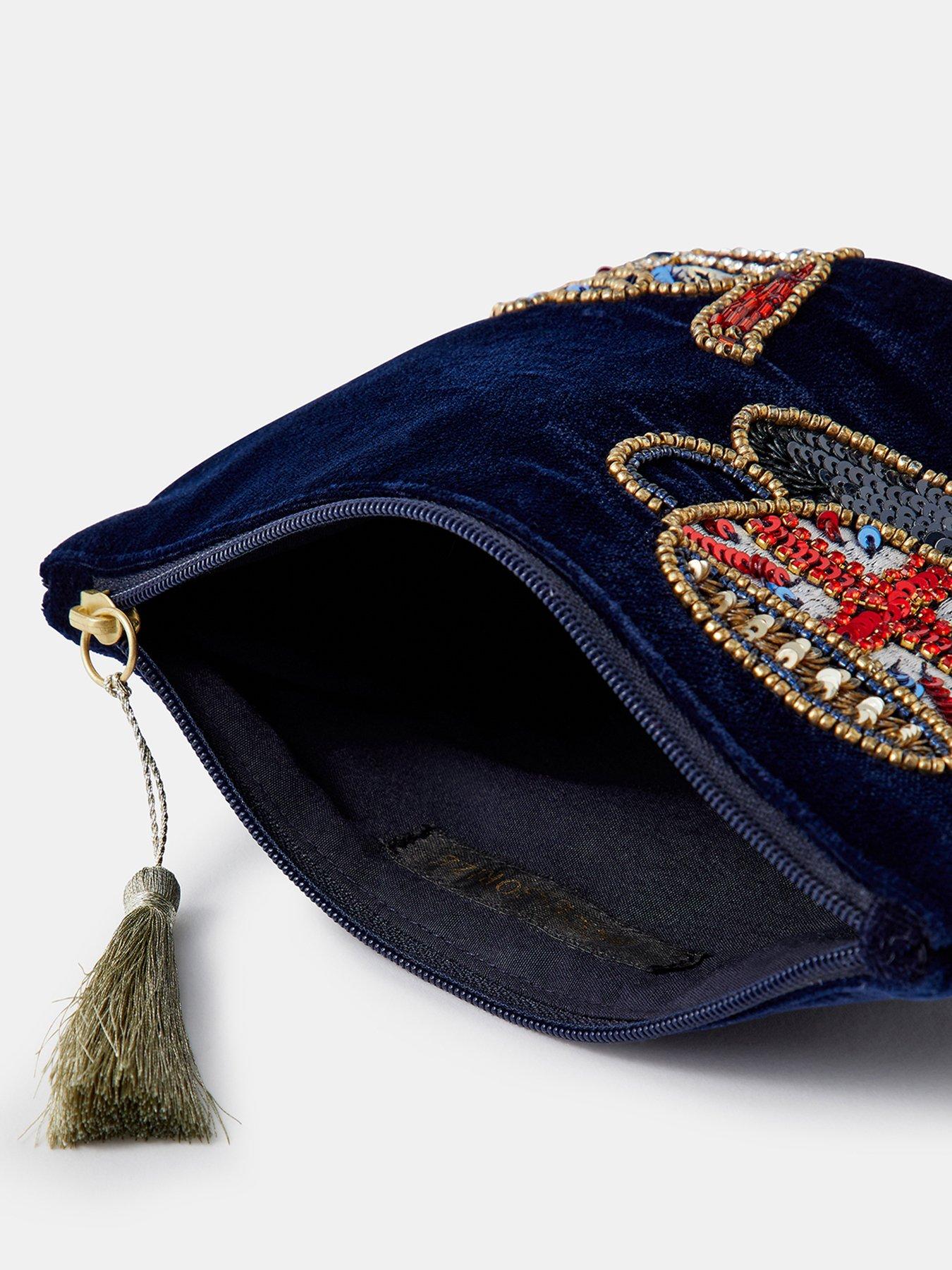Image 4 of 4 of Accessorize Womens London Embellished Motif Zip Top Slim Pouch - Blue