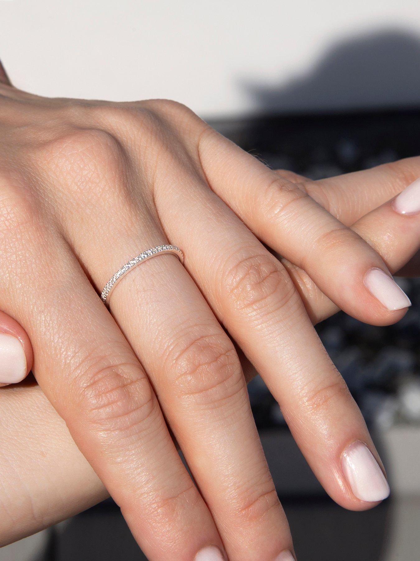The Love Collection Sterling Silver Rhodium Plated 1.5mm White CZ Eternity Ring