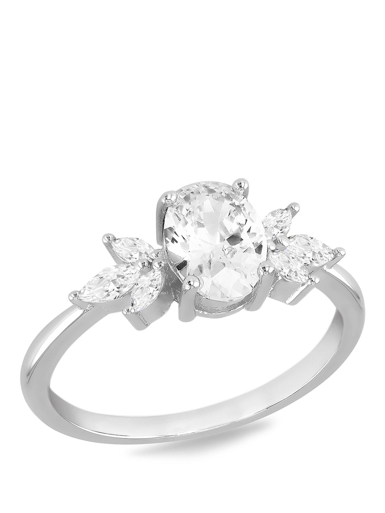 The Love Collection Sterling Silver Rhodium Plated 6x8mm White Oval CZ and White Marquise CZ Ring
