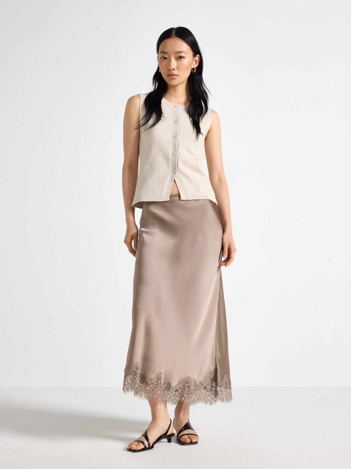 Image 1 of 4 of Lindex Women's Satin Midi Skirt with Lace Trim - Light Dusty Khaki