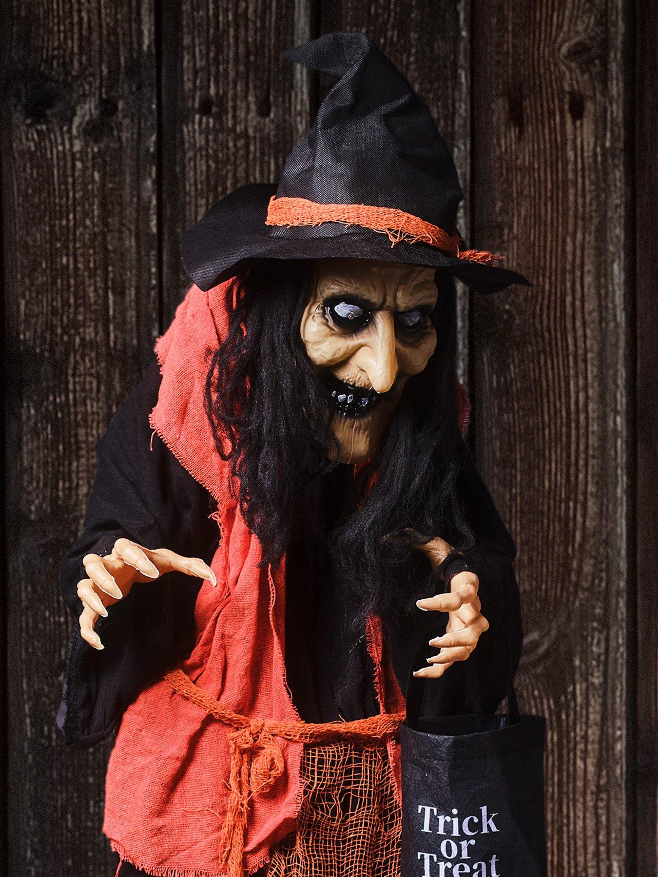 Image 3 of 6 of Lights4Fun 1.6m Animated Witch With Candy Bag Halloween Decoration
