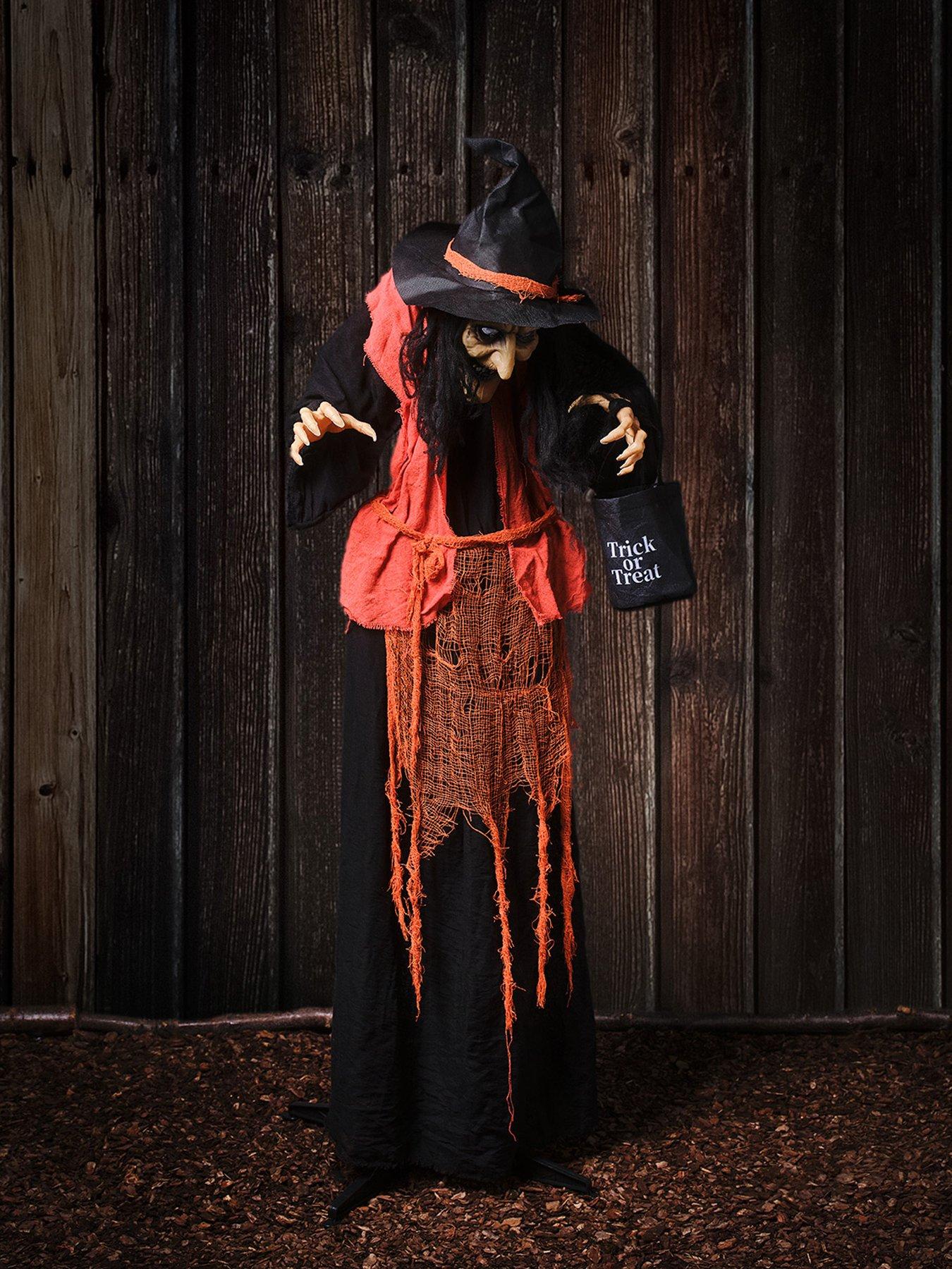 Image 5 of 6 of Lights4Fun 1.6m Animated Witch With Candy Bag Halloween Decoration