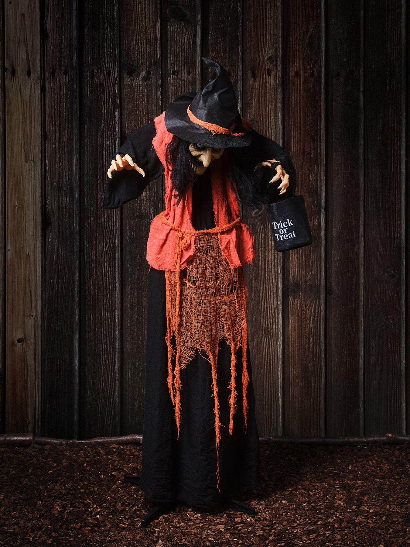Image 6 of 6 of Lights4Fun 1.6m Animated Witch With Candy Bag Halloween Decoration