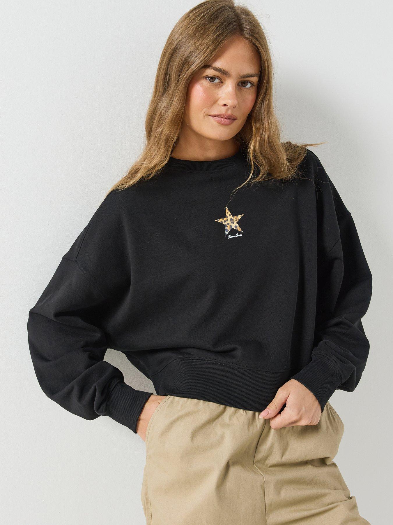 Image 1 of 6 of Guess Jeans Cropped Drop Shoulder Leopard Top - Black