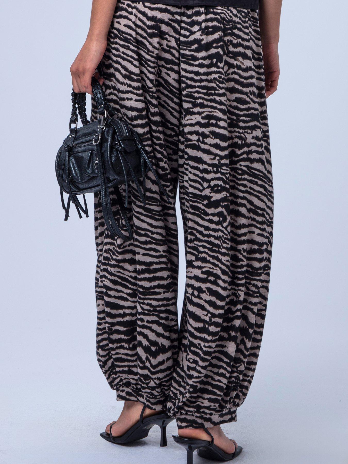 Image 6 of 7 of Religion Loose Fitting Lyla Jersey Trouser In Zebra Print With Cuffed Hem - Beige