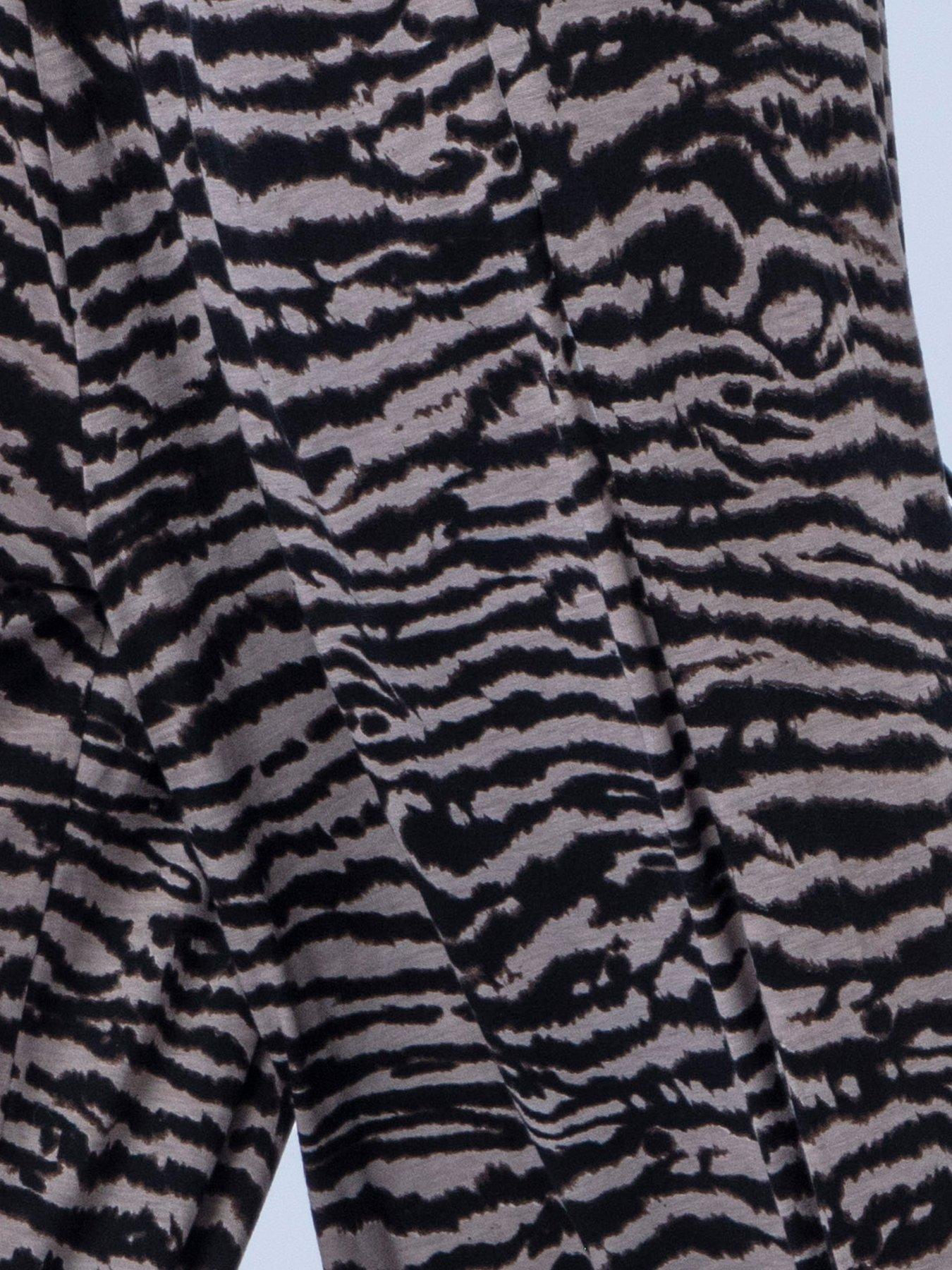 Image 7 of 7 of Religion Loose Fitting Lyla Jersey Trouser In Zebra Print With Cuffed Hem - Beige