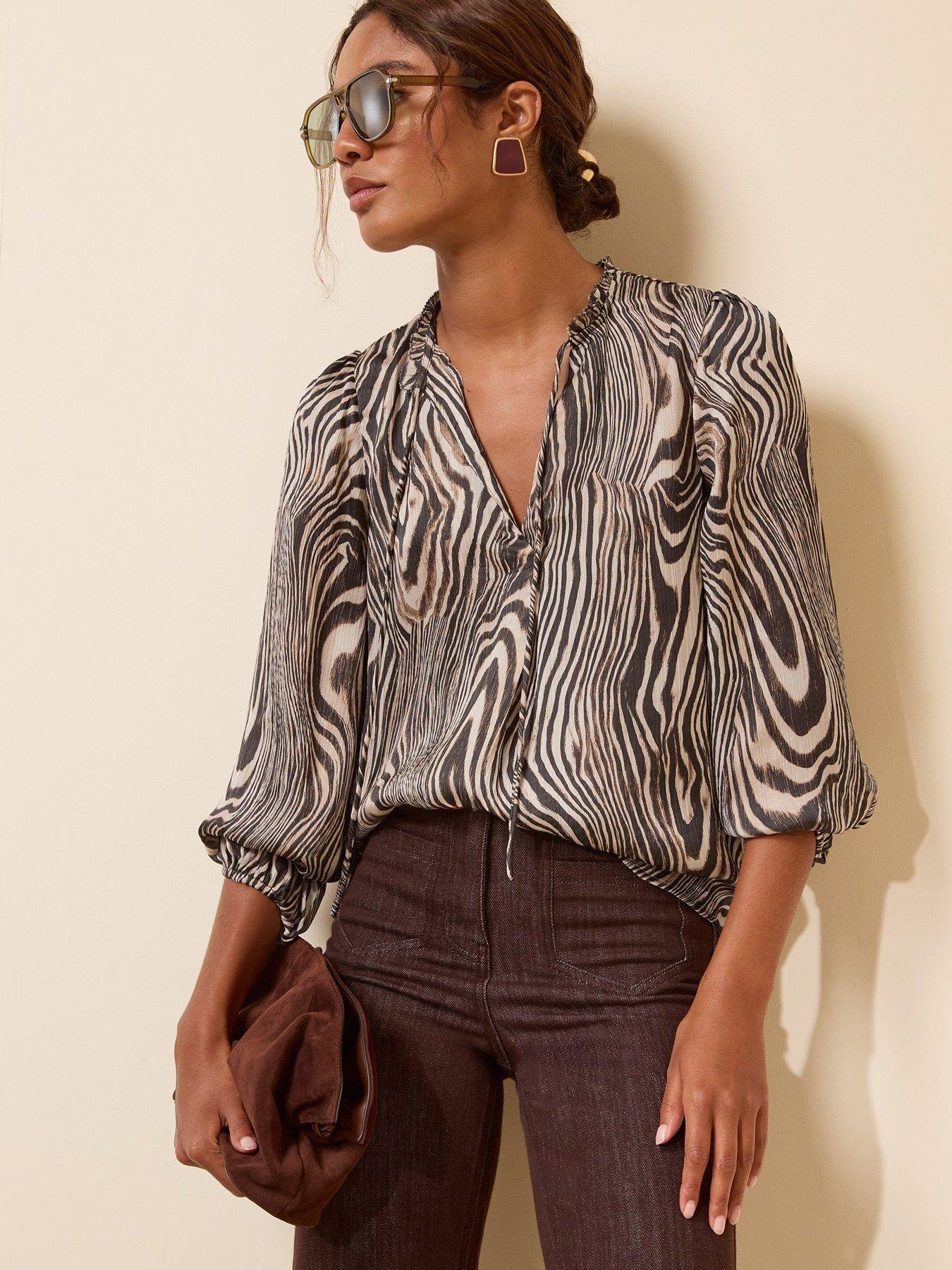 Image 1 of 5 of Friends Like These Zebra Print Long Sleeve Chiffon Tie Neck Blouse