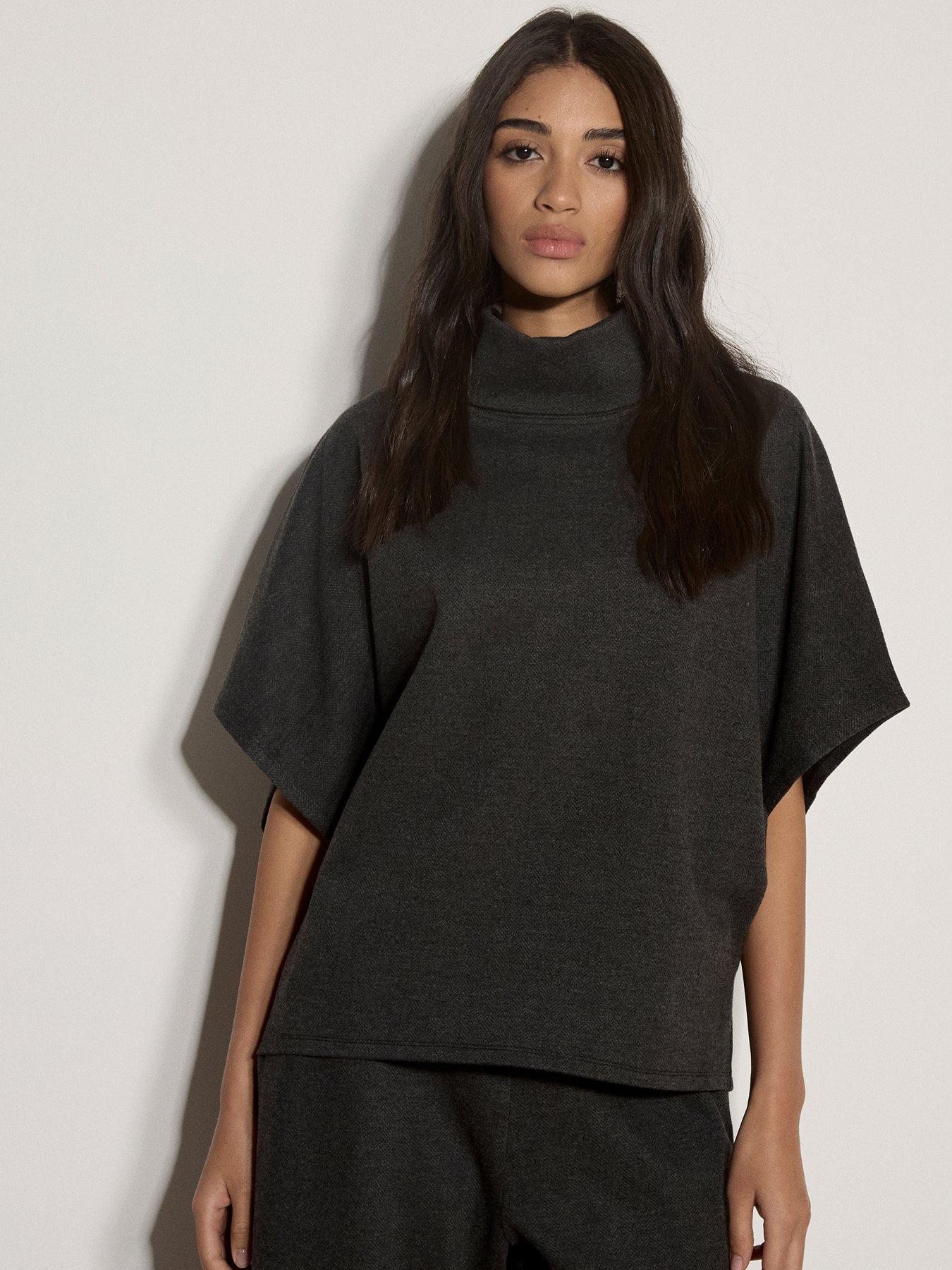 Image 1 of 4 of Apricot Herringbone Roll Neck Cape Top