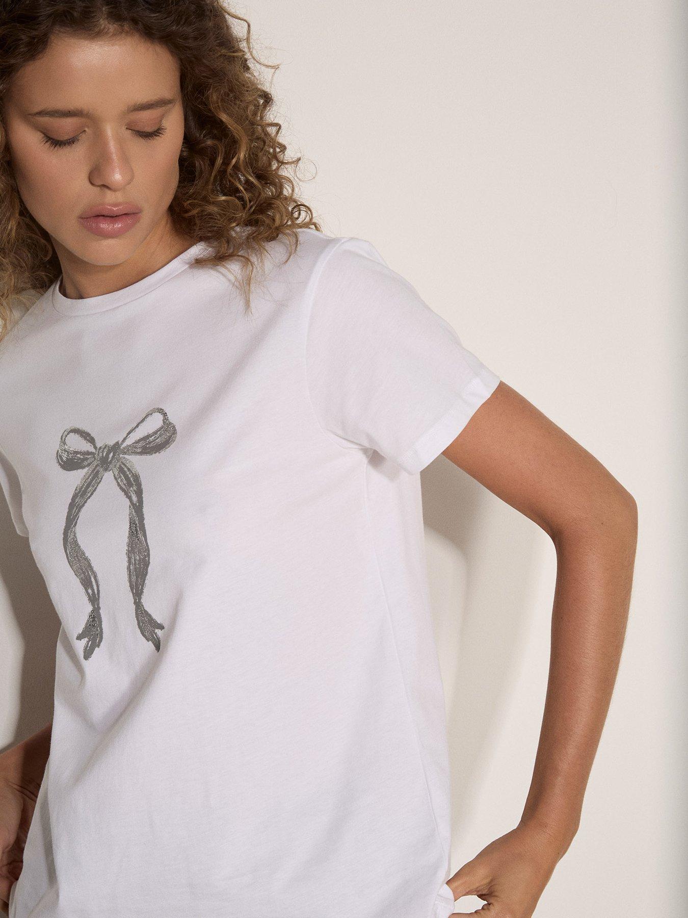 Image 4 of 4 of Apricot Foil Bow Graphic Tee