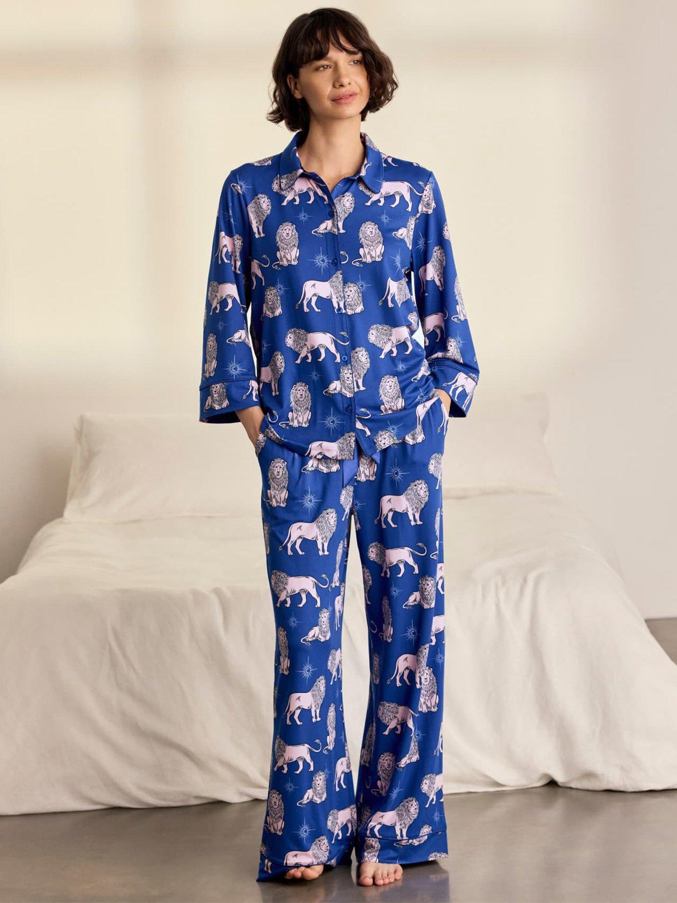 Image 1 of 6 of CHELSEA PEERS Moonlit Lion Print Long Pyjama Set - Blue