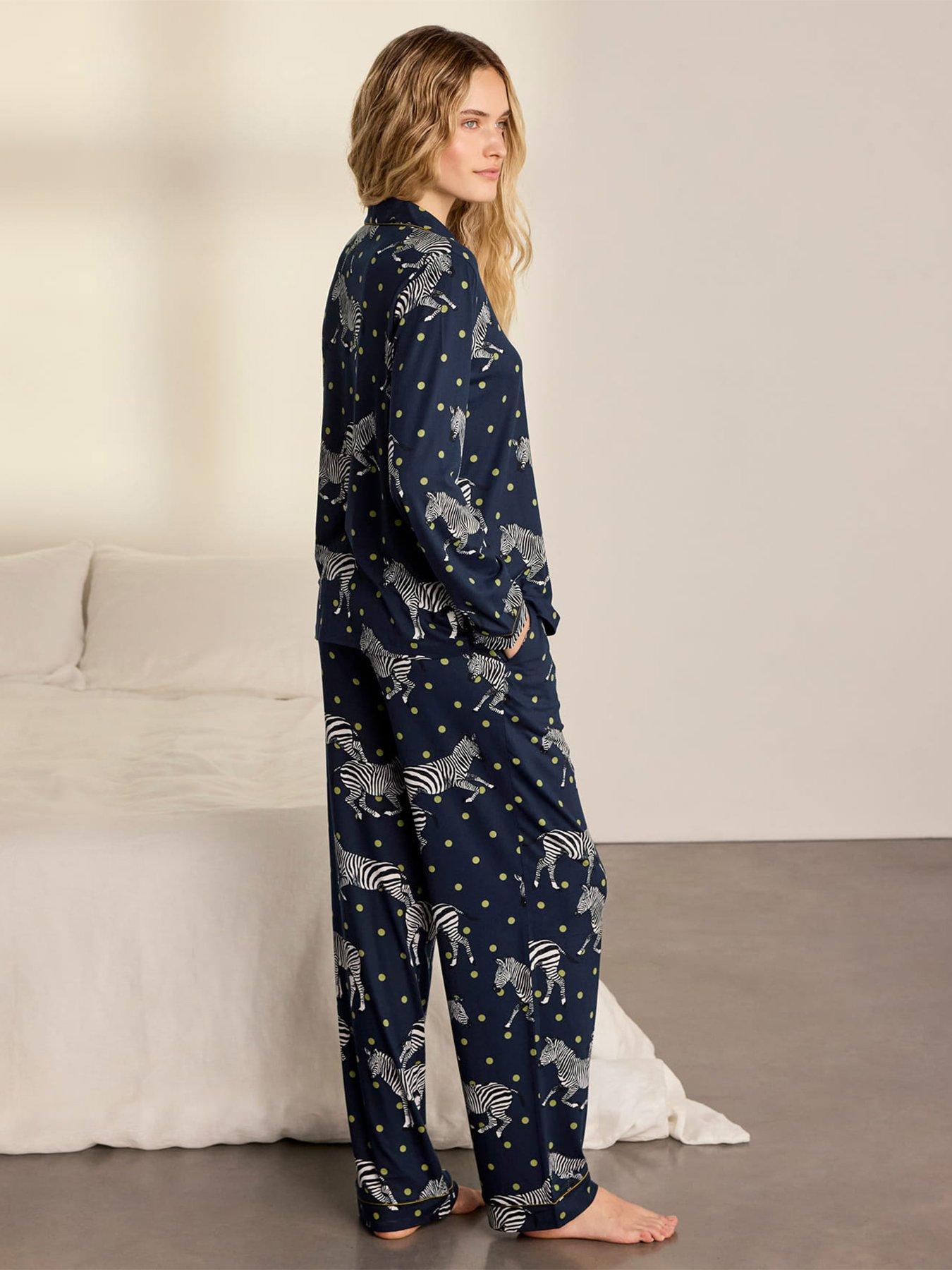 Image 2 of 6 of CHELSEA PEERS Polka Dot Zebra Print Long Pyjama Set - Navy