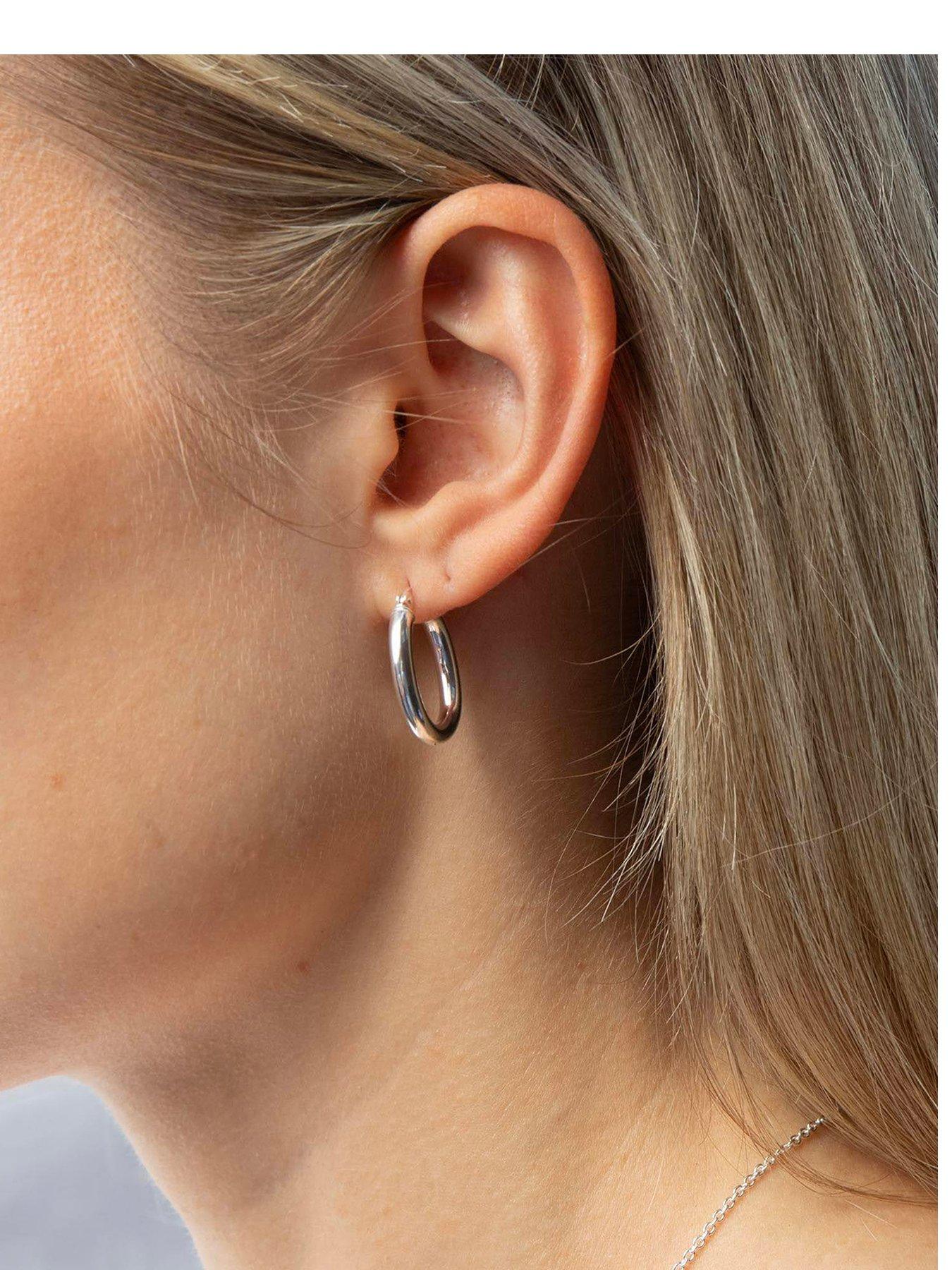 Image 1 of 5 of Seol + Gold Sterling Silver Mini Oval Hoops