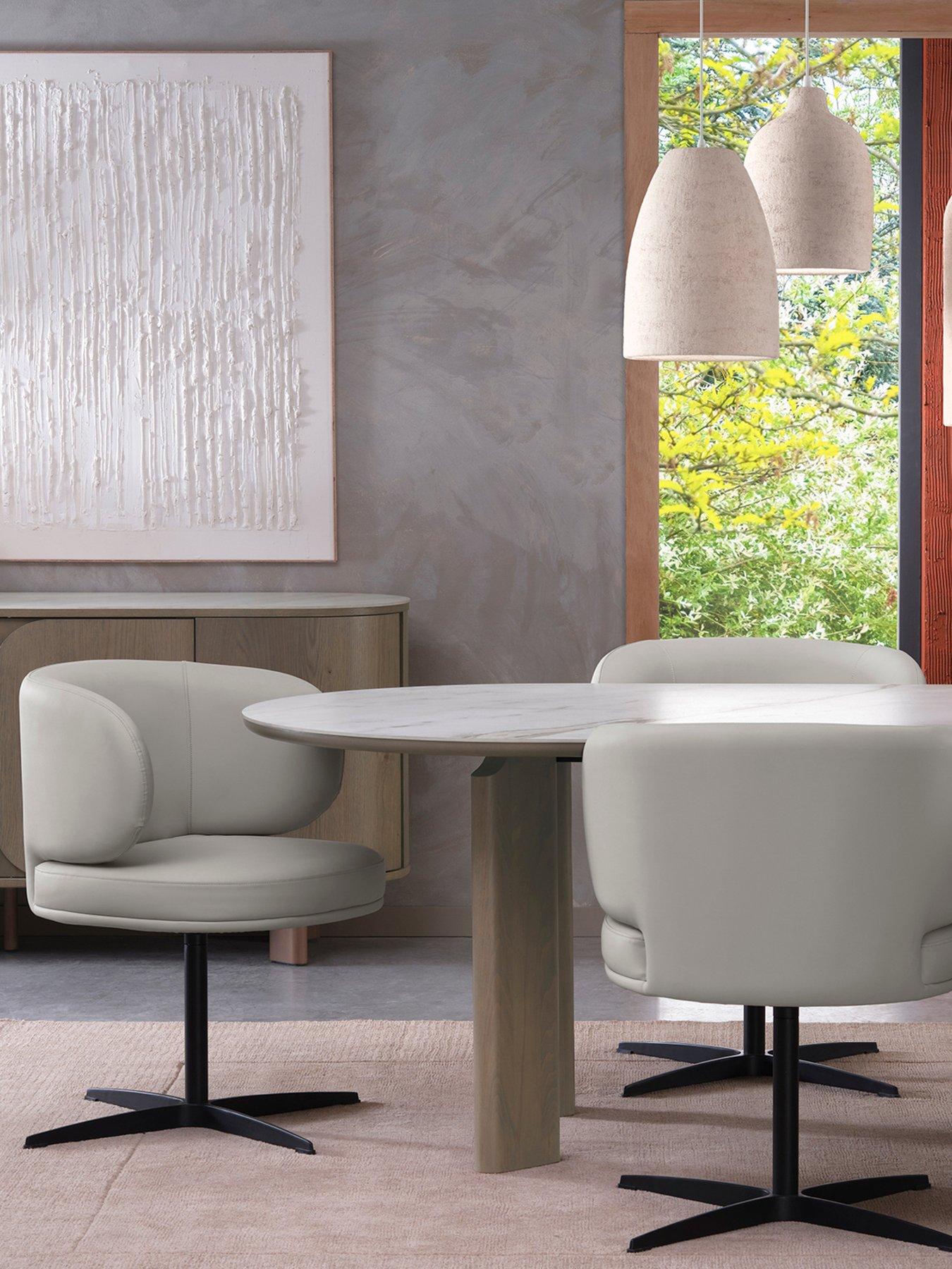 Image 1 of 6 of Bentley Designs Marcel Swivel Pair Of Dining Chairs - Light Grey Faux Leather