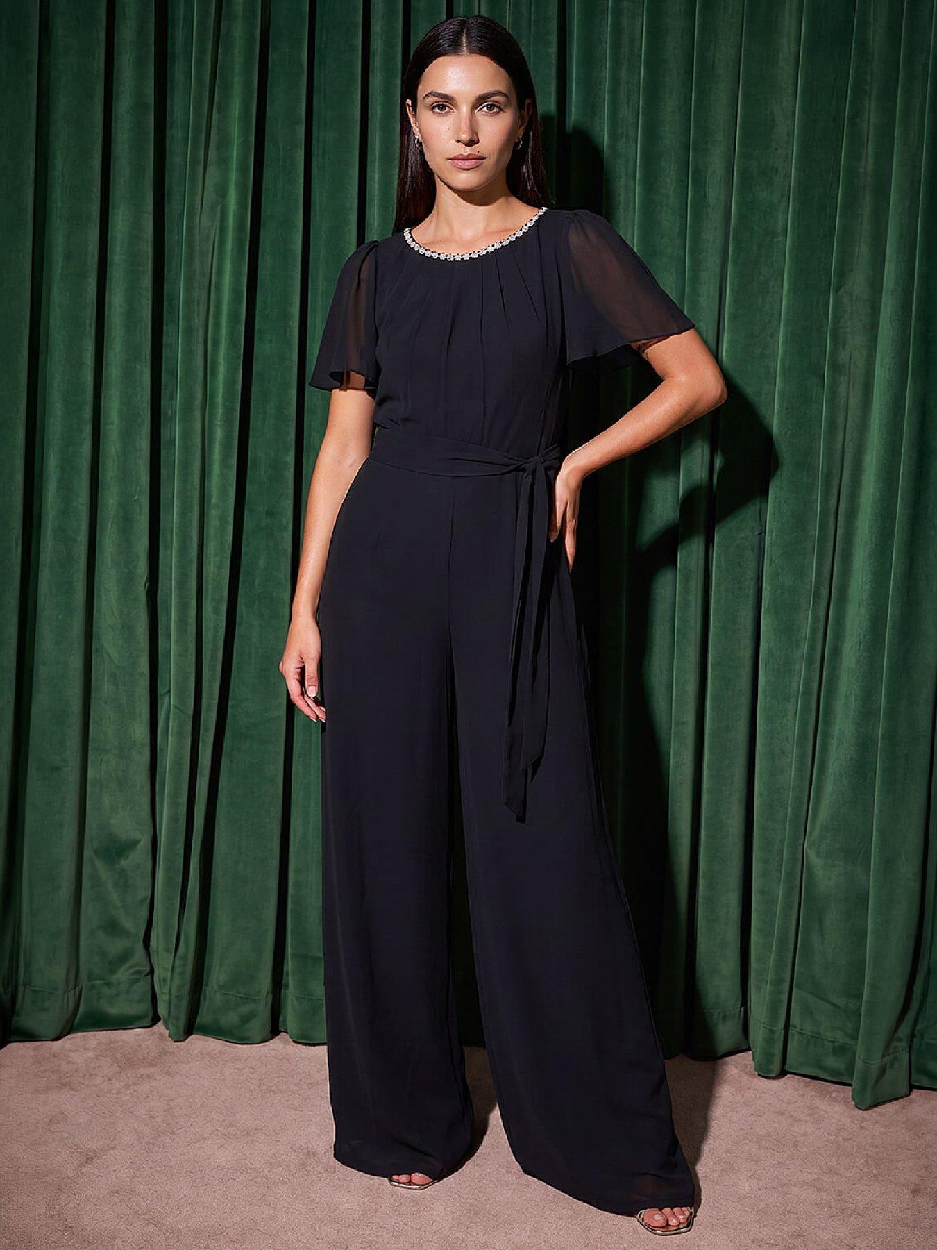 Image 1 of 4 of Roman Trim Neckline Jumpsuit