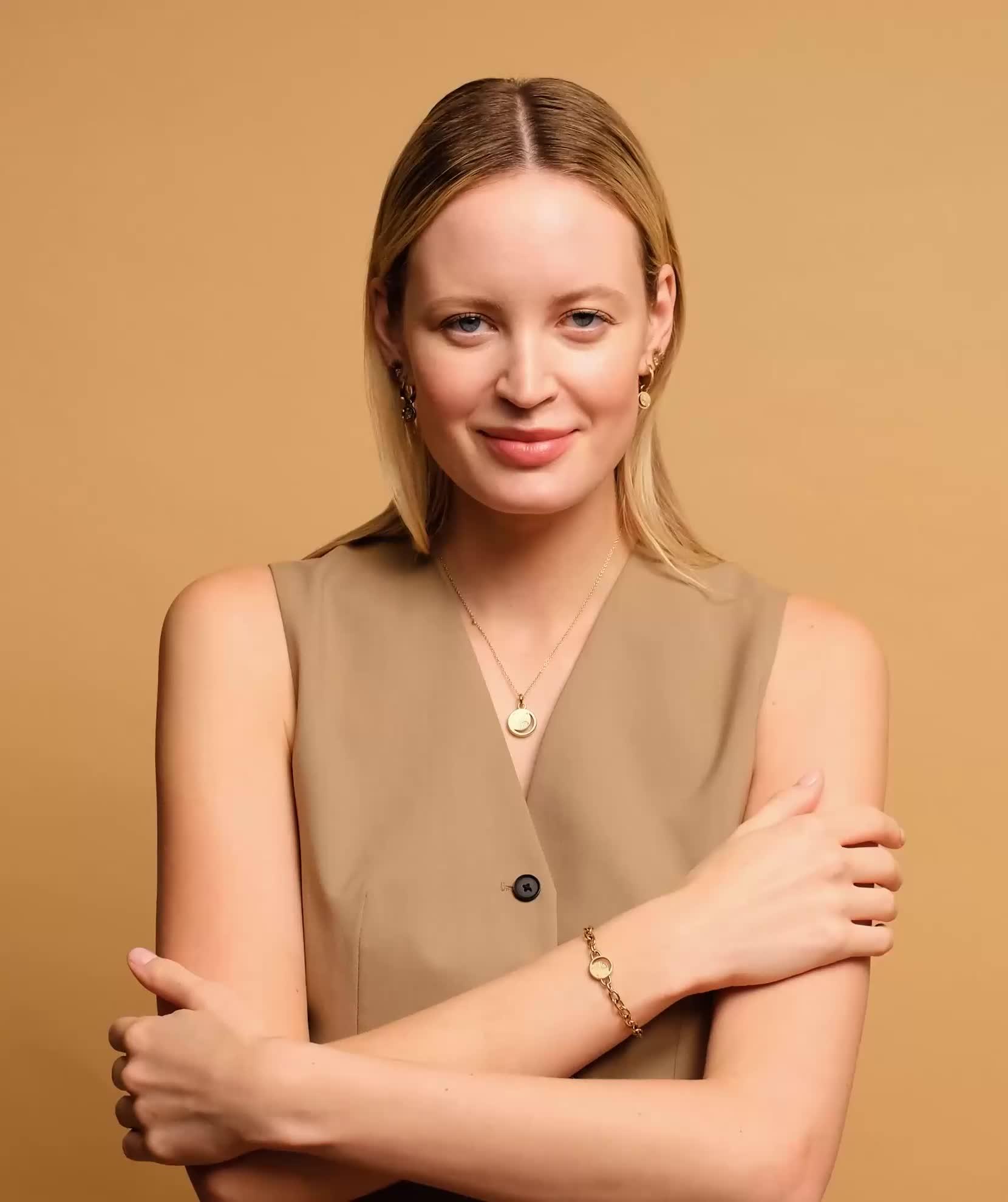 Image thumbnail 7 of 7 of Olivia Burton Gold IP Sun Hoop Earrings