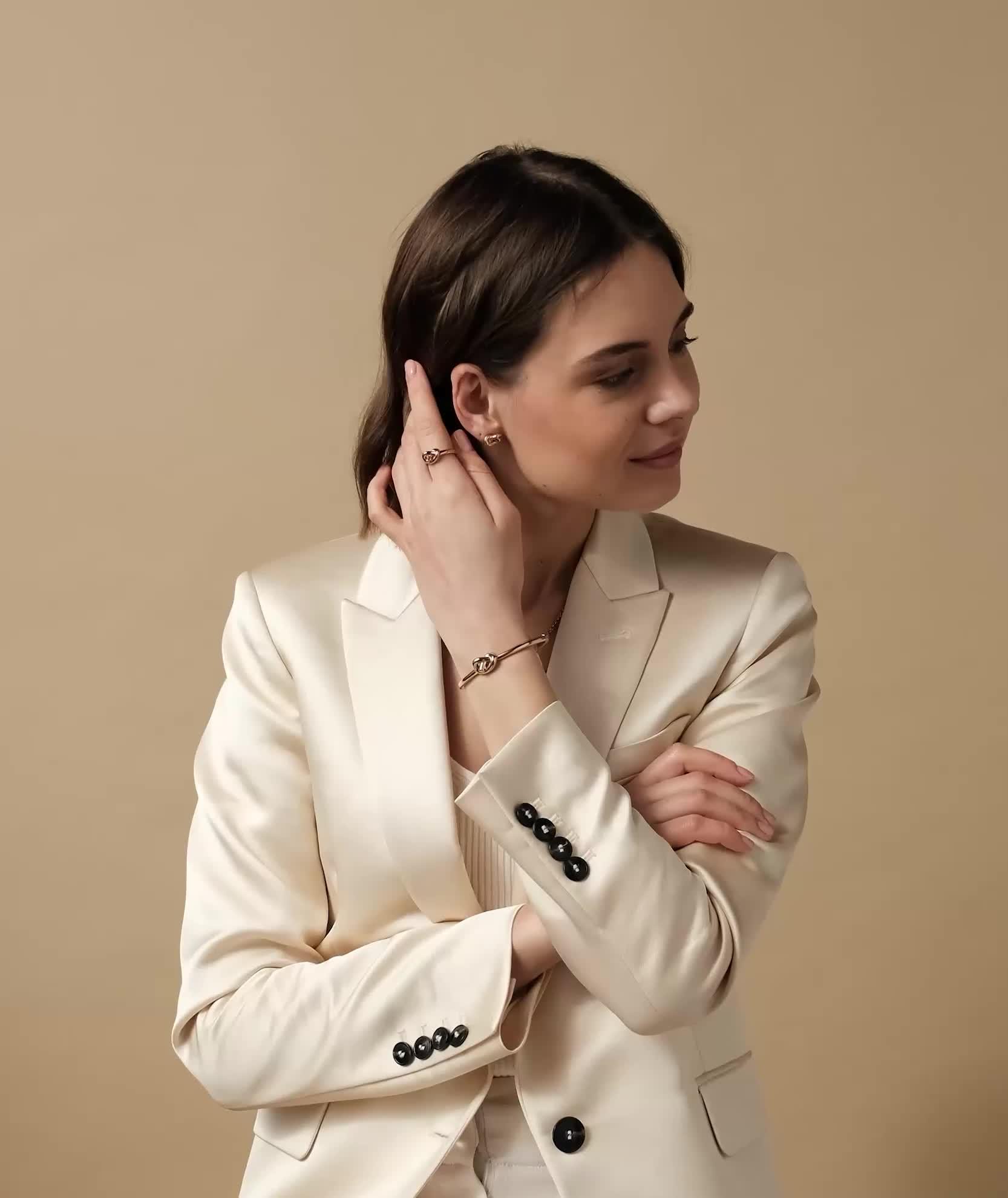 Video of olivia-burton-lovers-knot-gold-ip-stud-earrings