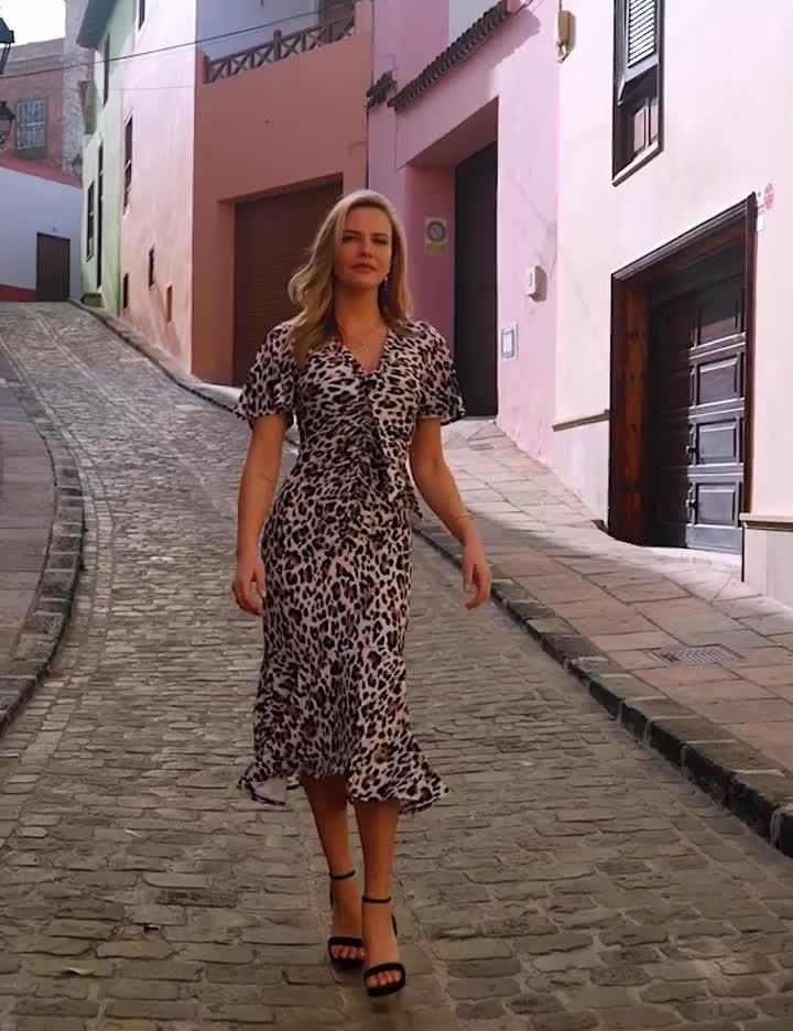 Video of sosandar-leopard-angel-sleeve-ruched-flippy-hem-jersey-midi-dress