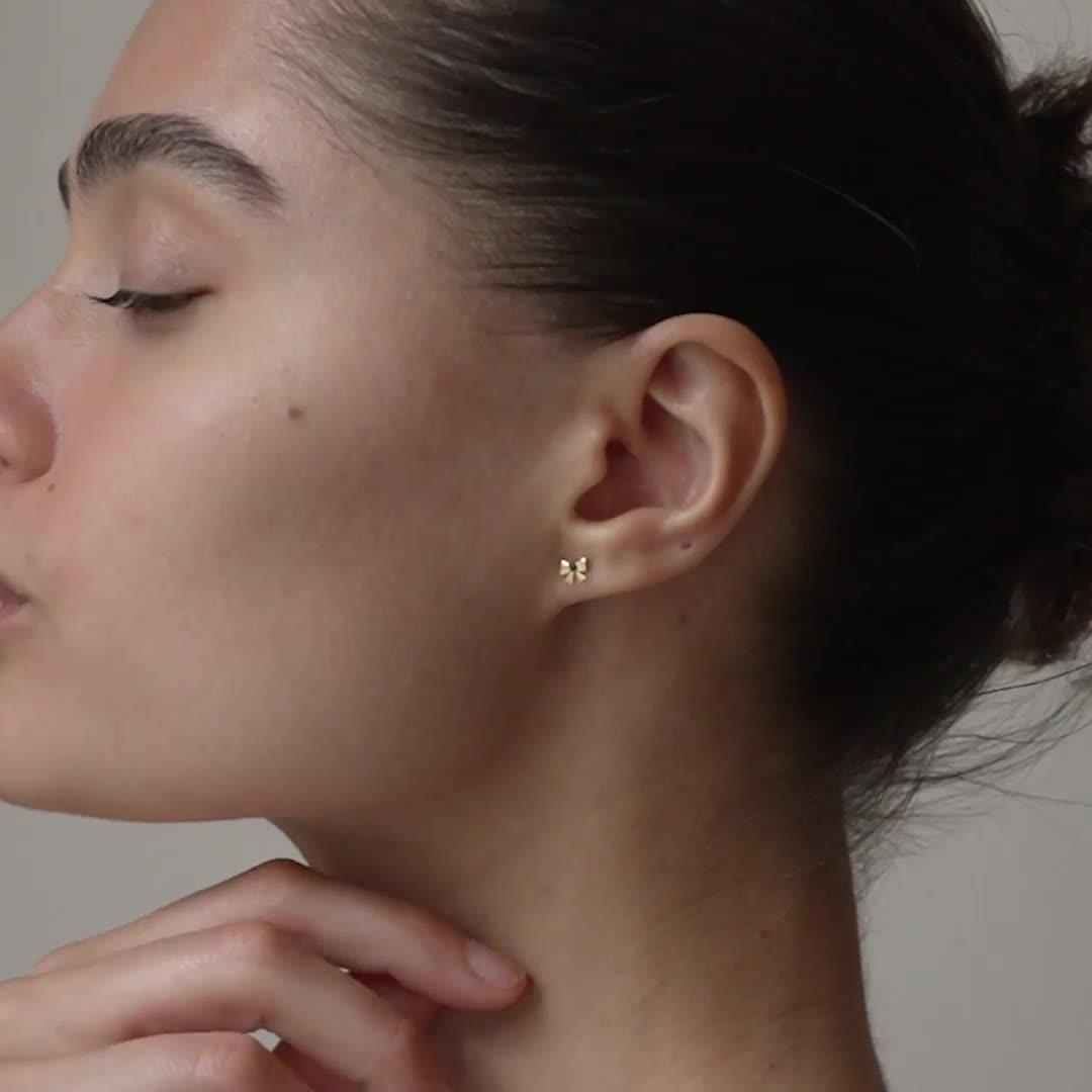 Video of enamel-copenhagen-baby-bow-stud-earrings-18k-gold-plated-sterling-silver