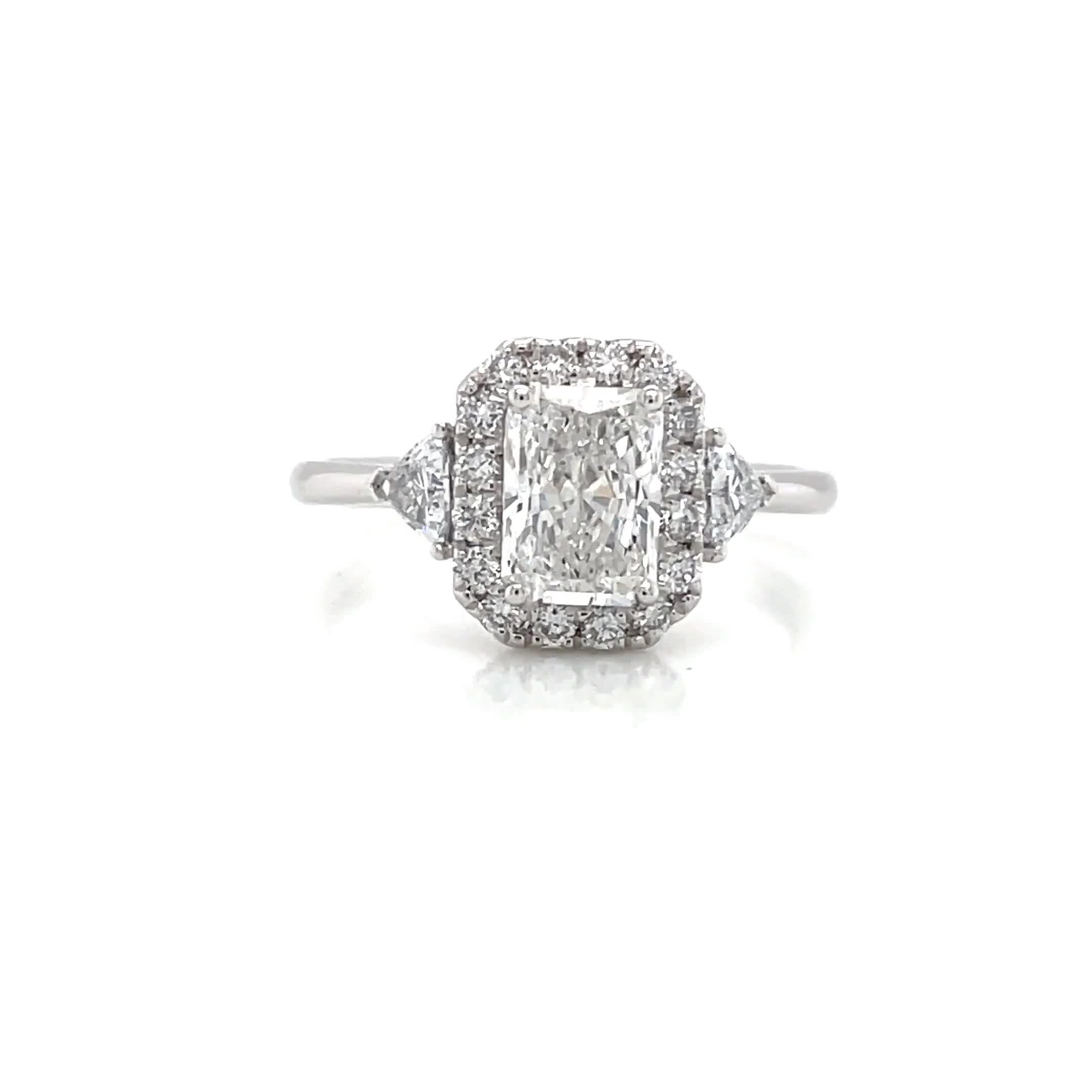 Image thumbnail 6 of 6 of Harriet Platinum Radiant Halo Trilogy &amp; Trillion Set Shoulders 1.50Ct Lab Grown Diamond Ring