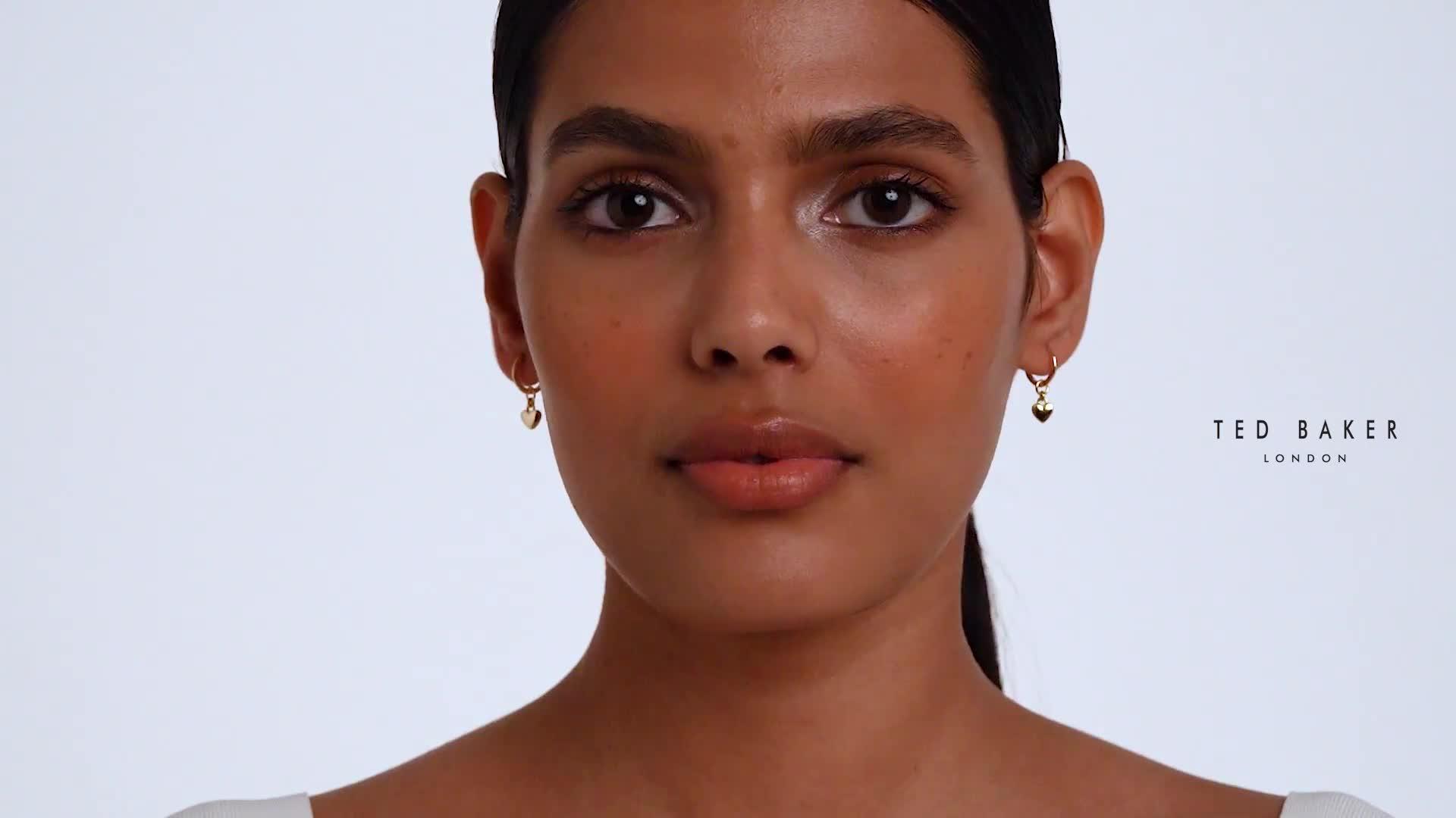 Image thumbnail 5 of 5 of Ted Baker HARRYE: Tiny Heart Huggie Earrings
